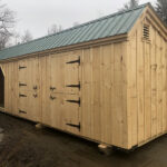 4-0 JCS Built 2" thick Pine Dutch Door on 10x30 Three Stall Barn. Exterior view. Black Drop Latch and Strap Hinges.