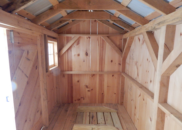 Interior of a small post and beam storage shed