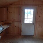 9-Lite insulated steel door built into a cottage