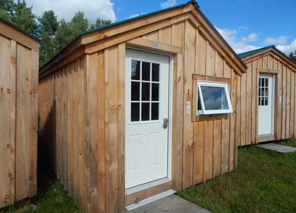 One room cabin with an insulated window and door.
