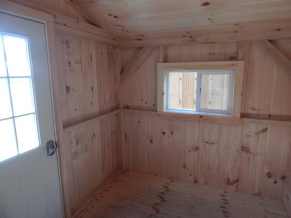 Sliding insulated windows installed inside a tiny cabin