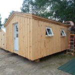 A simple prefab mini cabin with insulated windows.