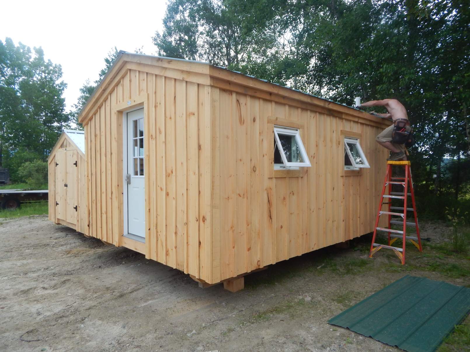 A simple prefab mini cabin with insulated windows.