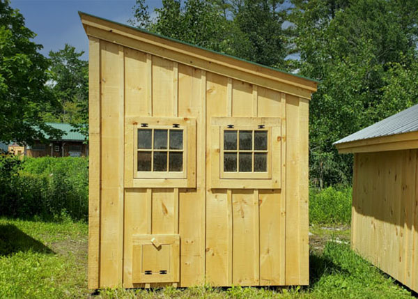 A minimalist shed roof buidling constructed out of pine and hemlock.
