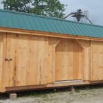 12x20 Three Sled Shed with Evergreen Roof