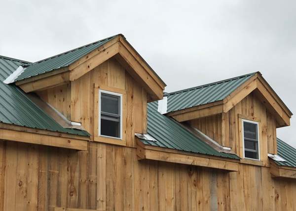Two Dog House Dormers installed on a Vermont Cabin