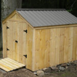 80 square foot storage shed with a gray metal roof.