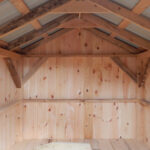 Interior of a storage shed made with post and beam hemlock lumber framing.