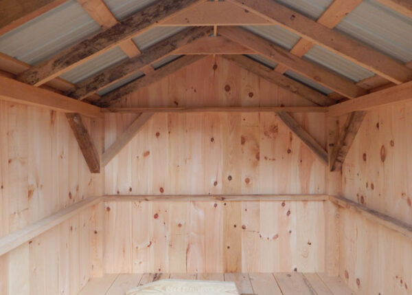 Interior of a storage shed made with post and beam hemlock lumber framing.