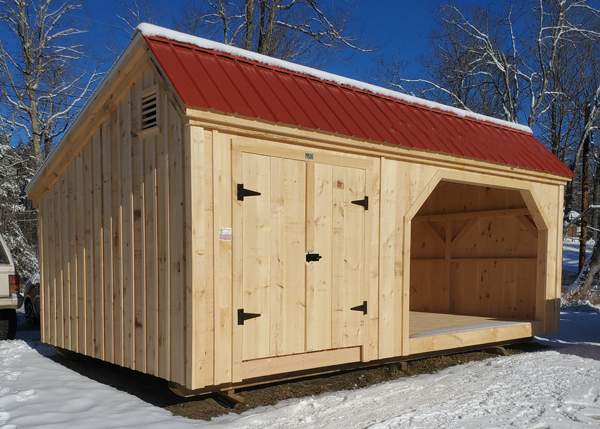 Multipurpose storage shed with a red metal roof.