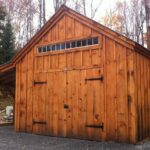 280 square foot garage with pine double doors and an overhang.