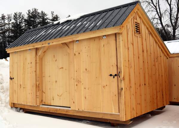 Shed with three sliding doors