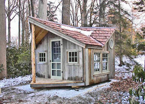 12x16 Backyard Retreat with cedar shingle roofing, copper ridge cap and flashing, and extra barn sash windows.