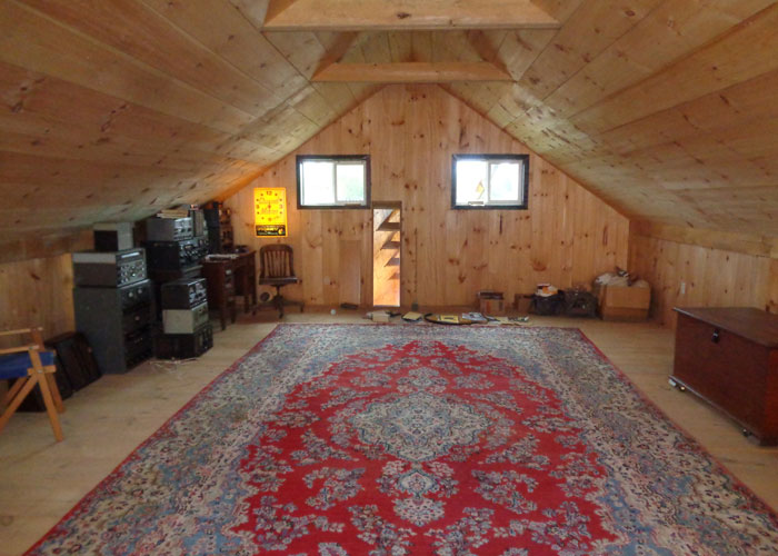 20x40 Vermont Cabin - Interior Loft with shiplap pine ceiling sheathing and two insulated windows.