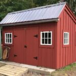 12x12 Saltbox bright red storage shed with extra windows and a charcoal gray roof