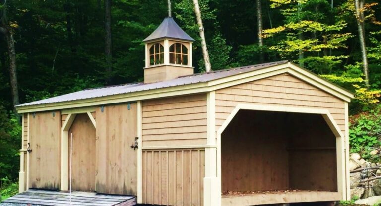 14x30-three-sled-shed-built-in-woodbin-custom-cupola-board-batten-siding-cedar-shake-siding-1024x554