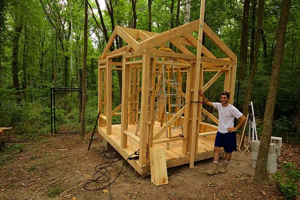 This customer looks pretty happy building one of our 8x10 Florida Room kits.