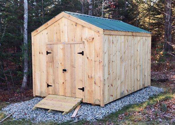 10x14 New Yorker post and beam storage shed with Evergreen metal roof, double door and pressure treated ramp