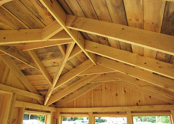 The Florida Room gets 2x6 Hemlock Lumber for the rafters and 1-inch thick industrial pine sheathing under the metal roofing.