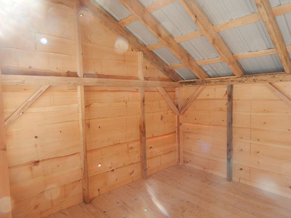 10x14-saltbox-horizontal-clap-interior-wall-rafters-floor
