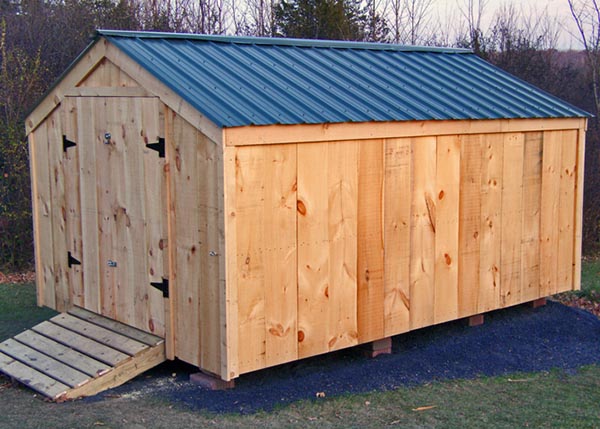The 10x14 Vermonter garden shed comes with an Evergreen corrugated metal roof, rough sawn pine board siding, pine double doors and a treated ramp.