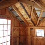 12x16 Backyard Retreat includes hinged barn sash windows and 3/4" CDX plywood decking
