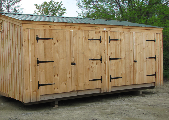 The 14x20 Barn Garage Option B includes an Evergreen Metal roof. This design is a popular choice as livestock shelter and/or landscaping equipment.