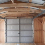 14x20 interior with overhead garage door and an addition of a hilnged window