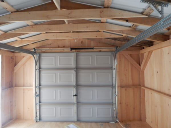 14x20 interior with overhead garage door and an addition of a hilnged window