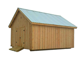 This tall wooden loft barn has a ramp leading up to a set of wide double doors, board and batten siding, and a green metal roof. This barn also features a hay loft
