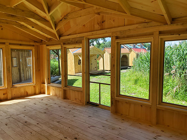 The Florida Room is constructed out of 4x4 rough sawn hemlock post and beam wall framing.