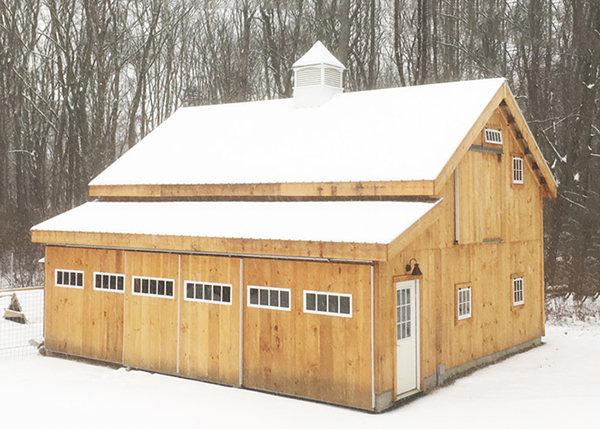 Add a workshop to your garage with an enclosure kit add-on.