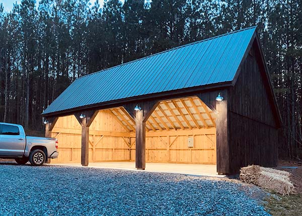 Once this Equipment Shed was built the customer stained it brown, and installed lighting inside and outside.