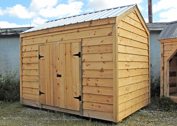8x12 New Yorker Option A shed with Adirondack Live Edge siding and a silver galvainzed corrugated metal roof
