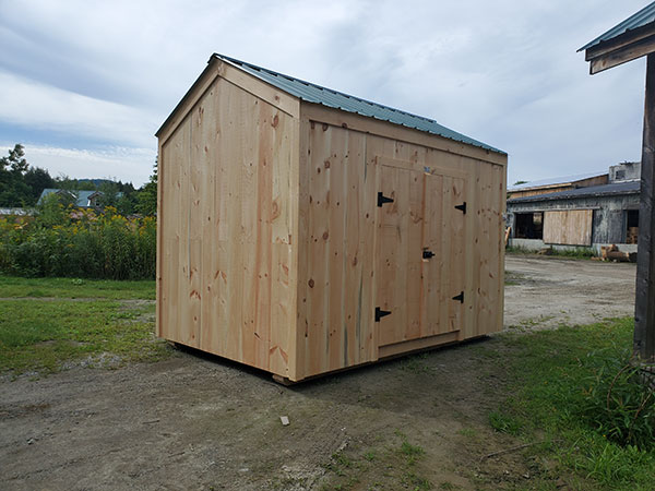 Our New Yorker storage sheds are built with pine board siding and a corrugated metal roof in Evergreen.