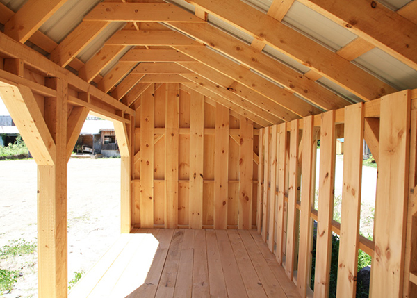 8x20 Woodbin interior with rough sawn pine alternating siding.
