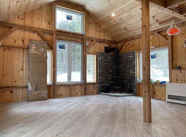 Double pane insualted window are energy efficient and can help with heating costs. We love the woodstove that was installed in this tiny home.