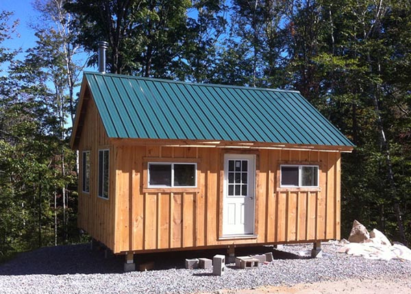 The Vermont Cottage kit comes with full insulation, double pane windows and an insulated steel door.