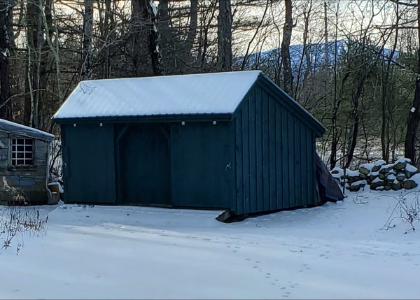 You can paint your shed any color. This storage shed was painted blue.