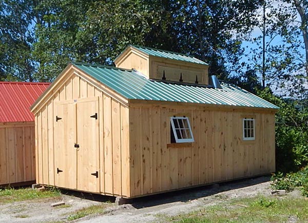Pine board and batten siding, an evergreen corrugated metal roof, functioning cupola, double doors and shed windows are included with this complete sugar shack kit.