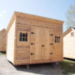 Inventory building shed roof with log cabin siding