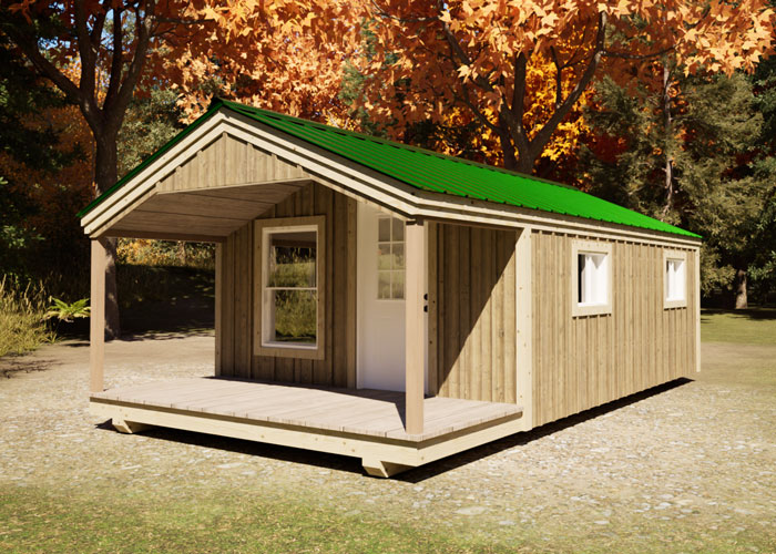 Front view of the Del Sol Cabin showing large porch, insulated door, and large front window