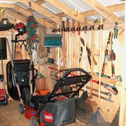 Use racks and hooks to hang stuff in your shed