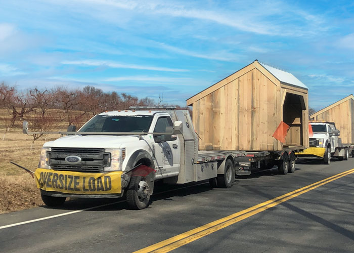 Jamaica Cottage Shop Trucks Delivering a Wood Run-In Shed