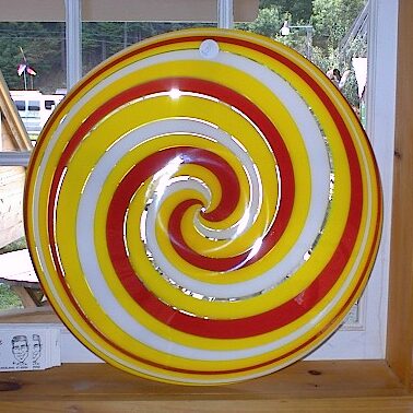 Handblown local artisan Stained glass Roundel with an 18" diameter, 1/4" thick. One of a kind pieces or art for your cottage decor.